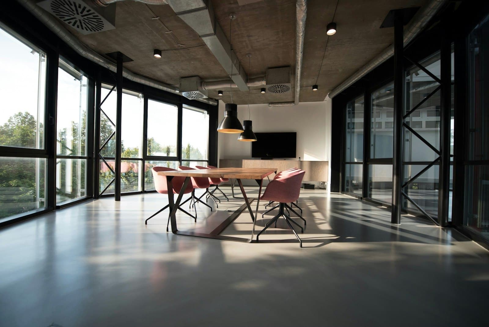 Clean modern office meeting area with polished floor